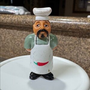 The figurine is "Gordo the Chef" from the Homies Series 3 collection.